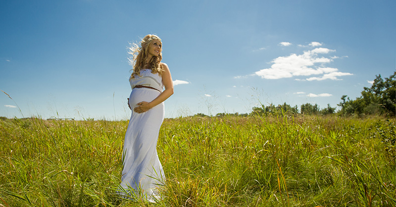 September Maternity Portrait in Prairie Grass at Sertoma Park in Sioux Falls