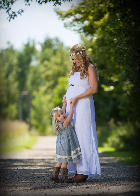 Mother and daughter maternity portrait